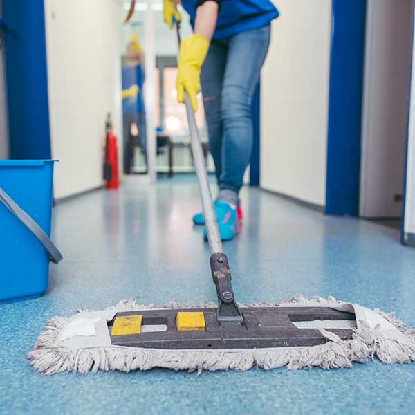 Man Cleaning the Floor